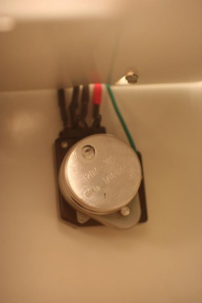 field modification of the defrost timer in a Maytag-built refrigerator with ADC